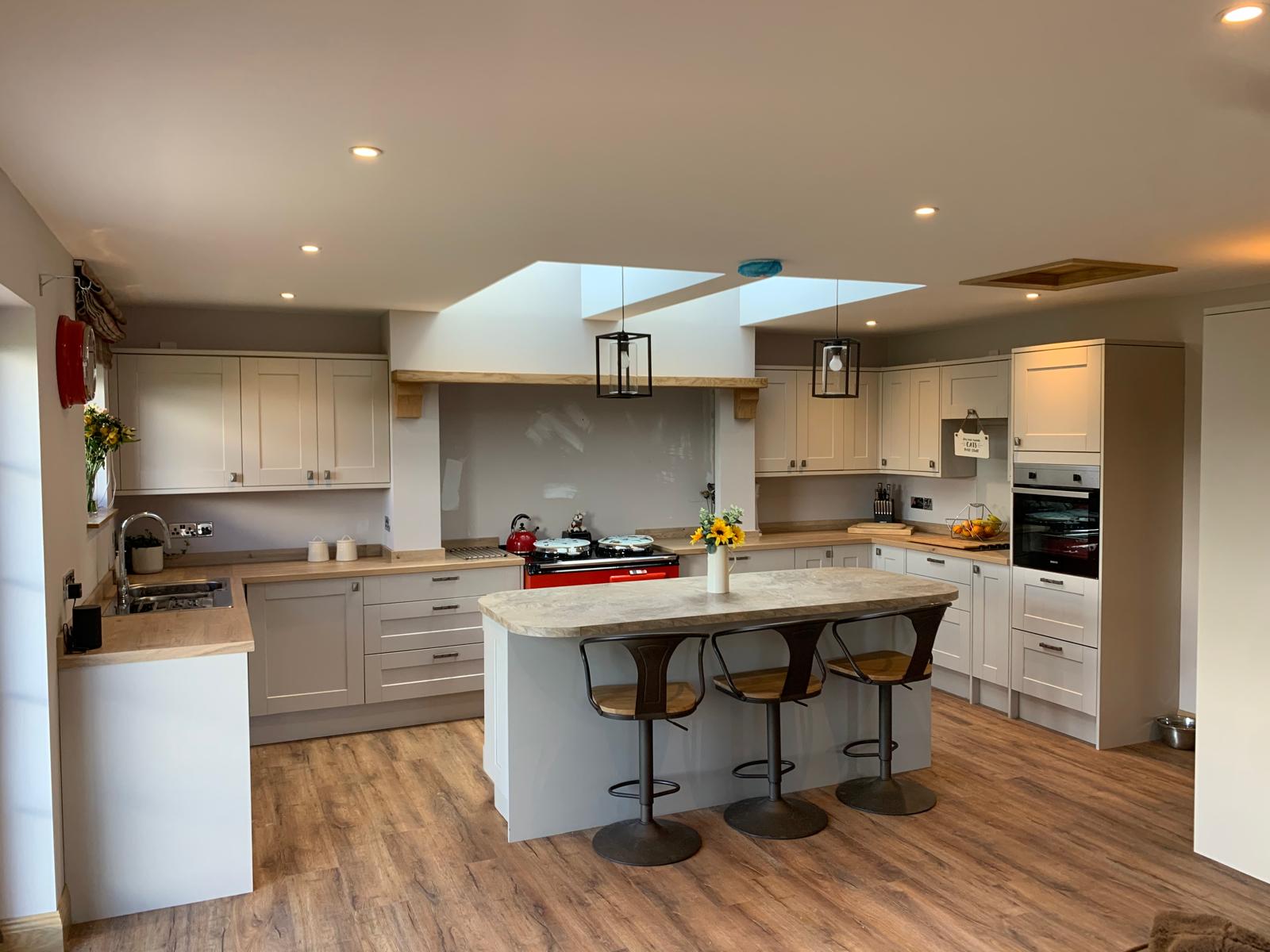 Farmhouse kitchen with island and bar stools
