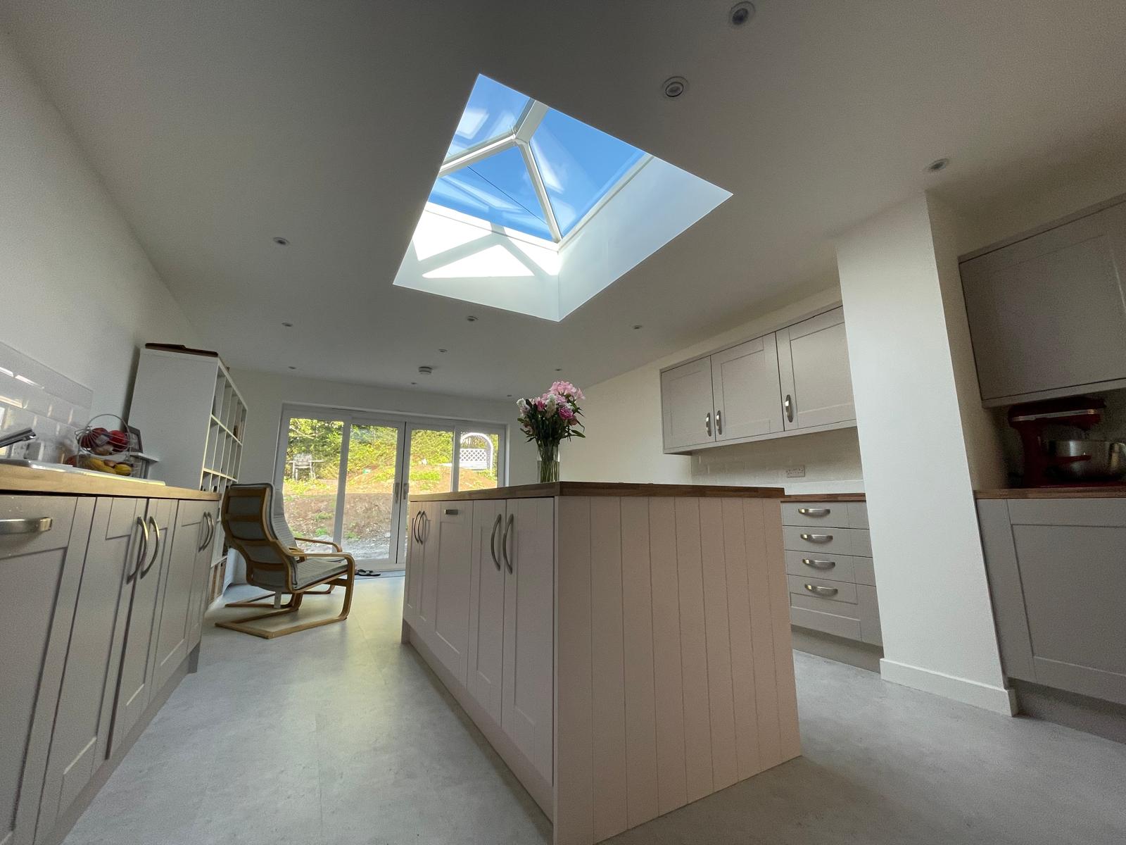 Kitchen extension with lantern roof and island