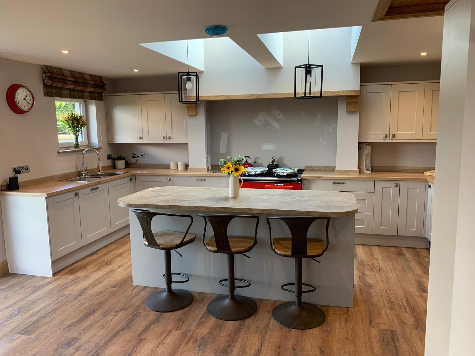 Shaker kitchen with skylights and breakfast bar