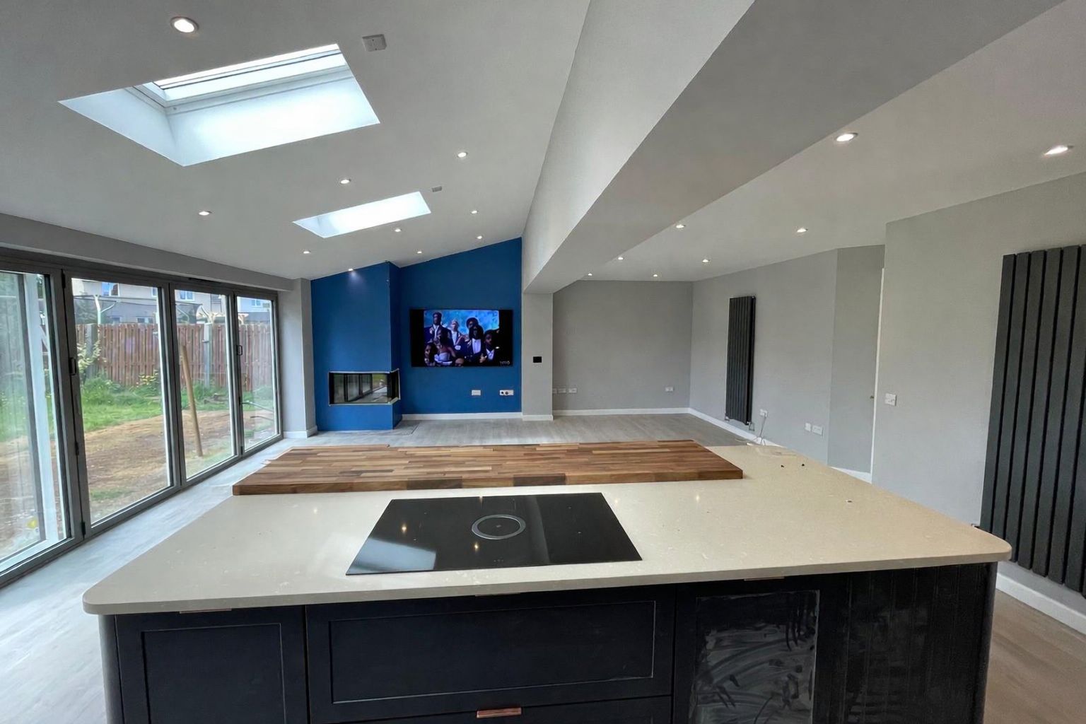 Open-plan kitchen extension with skylights and island