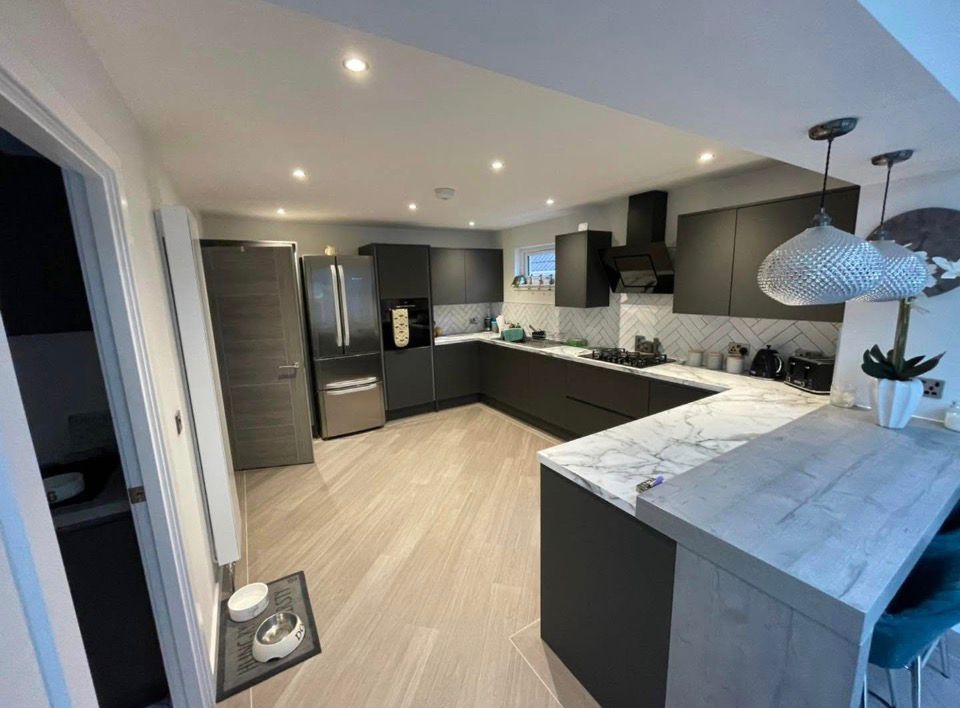 Modern kitchen renovation with marble worktops by Marshall & Co in Perth