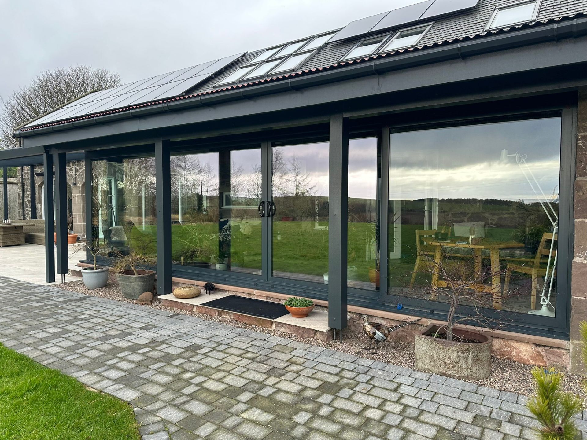 Aluminium bi-fold doors with garden views in Perthshire